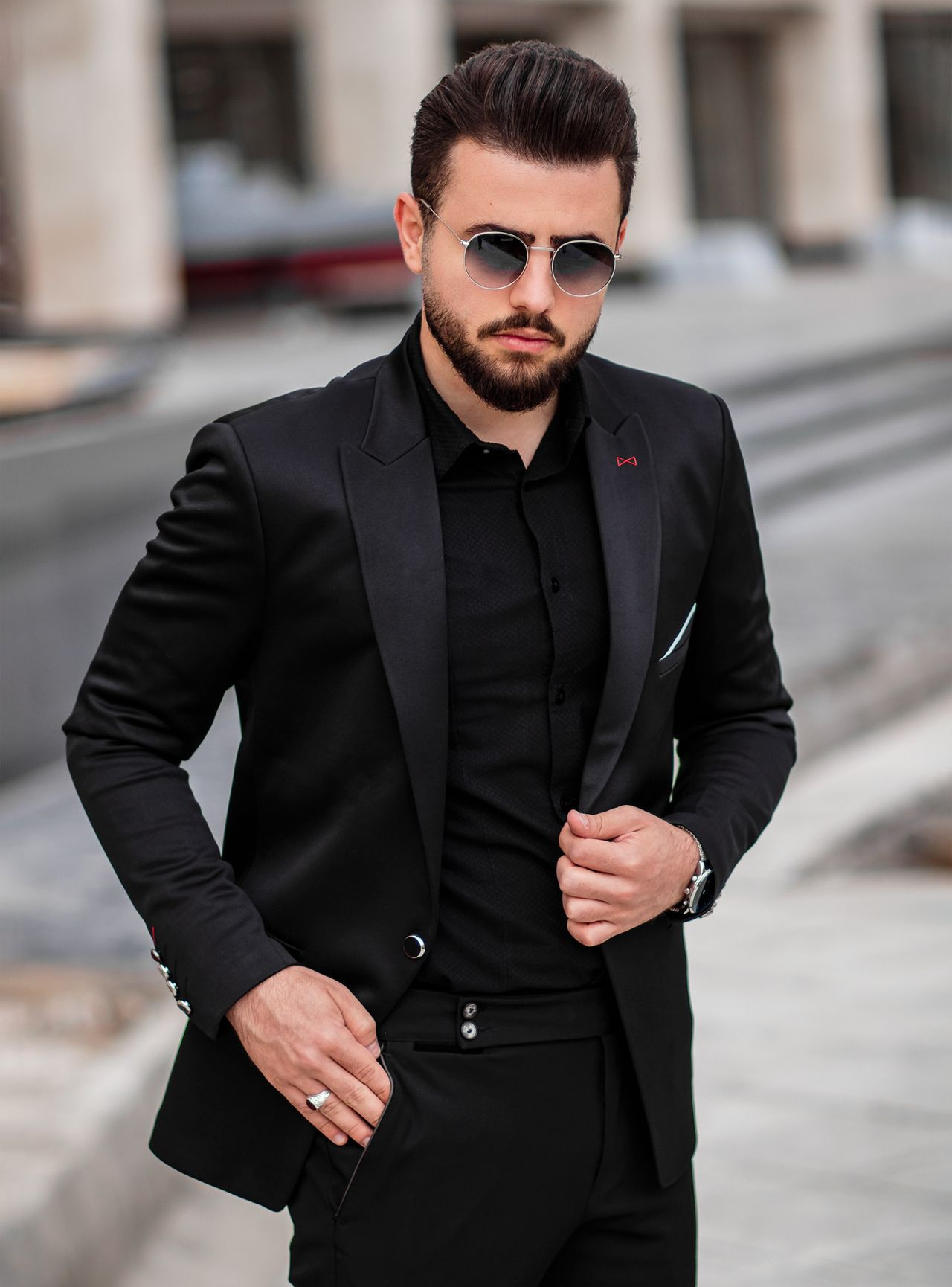 man in black suit jacket and black sunglasses